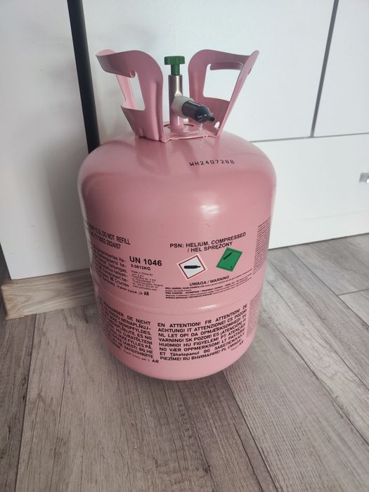 Pusta butla po helu różowa stan idealny