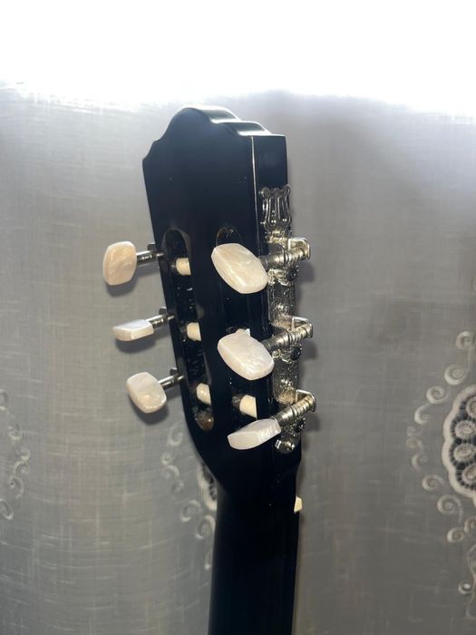 Vendo Guitarra + saco + afinador e palhetas