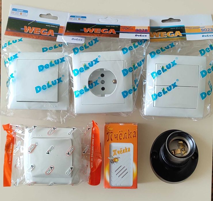 Розетки вимикачі DeLux