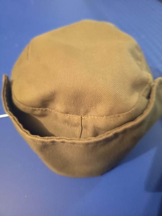 Conjunto colete/cartucheira/boné de caça