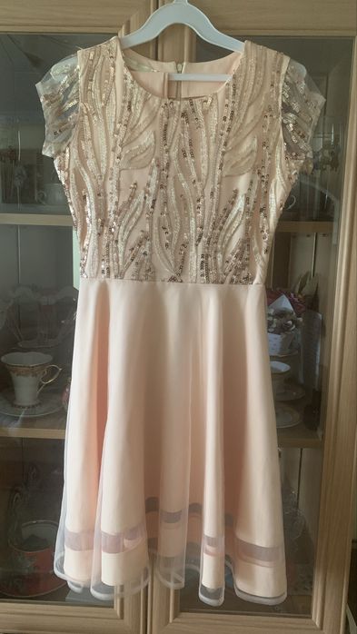 Плаття для дівчинки на 11 років. Стан практично новий . Одіте один раз