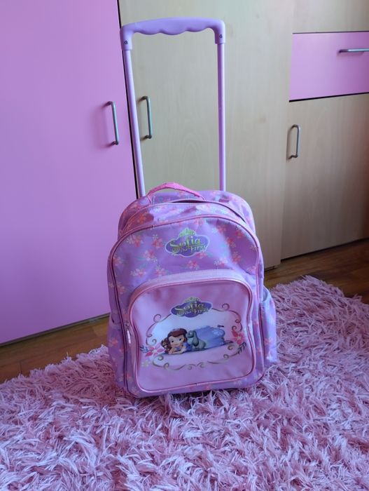 Mochila escolar em bom estado mas com marcas de uso