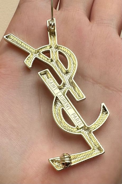 Broszka YSL złota metaliczna 6,7 cm