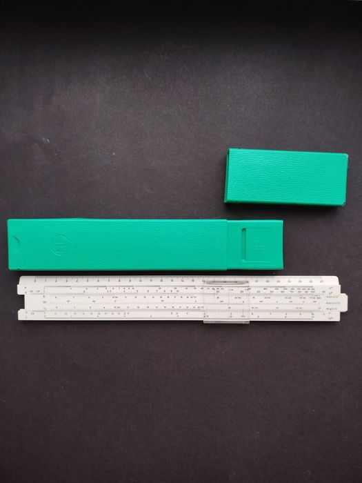 Логарифмічні лінійки 76-77 роки дерево/пластик.