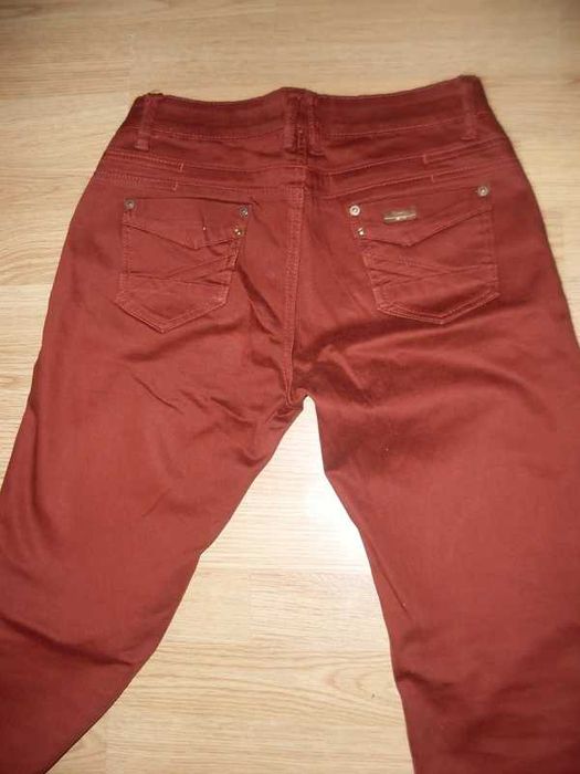 spodnie rude rurki biodrówki 38