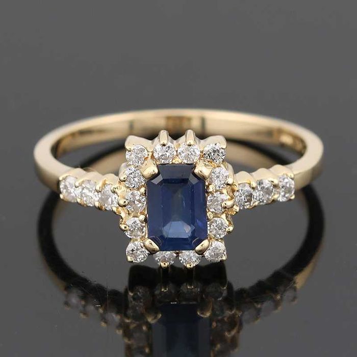 Złoty pierścionek z szafirem 0.60ct i diamentami 0.36ct 14K