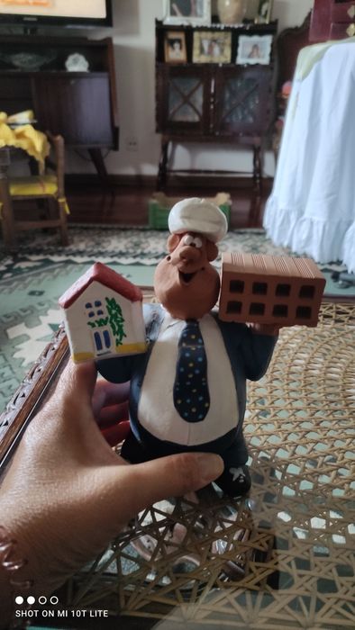 Boneco em barro construção civil64738602623233121