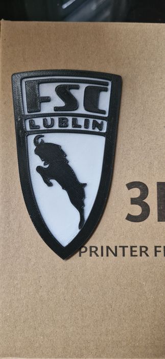 Emblemat Zuk zrobiony w technologii druku 3D. Różne warianty (opis)