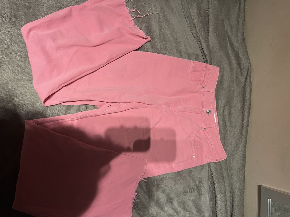 Różowe jeansy straight 36