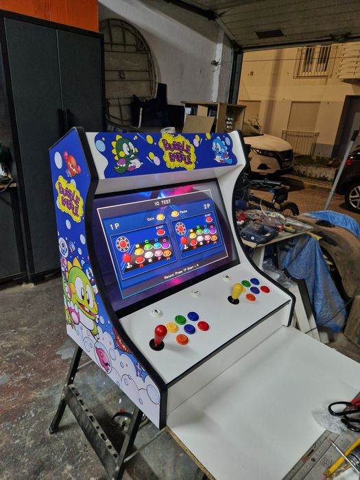 Máquina de jogos, Arcades