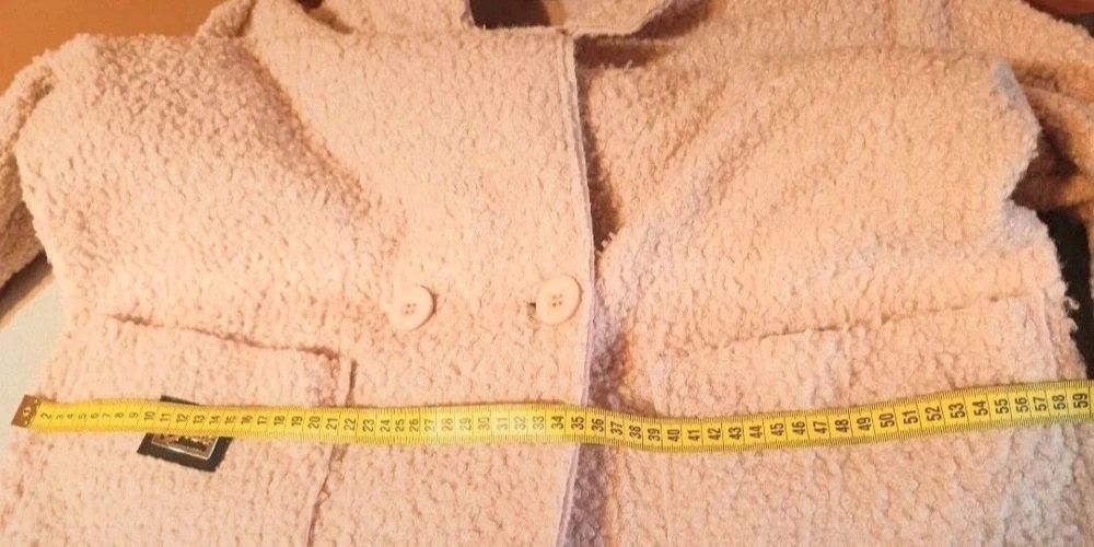 Płaszcz rozmiar 42/44 marki Butik