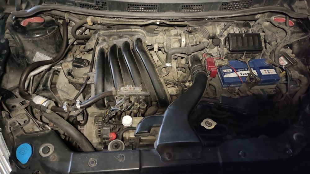 Продам Нисан тида на коробке автомат