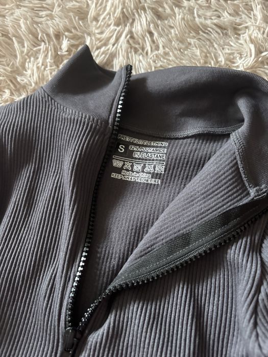 Сірий комбінезон в рубчик PLT