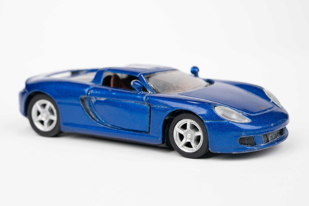 колекційна модель автомобіля  Porsche Carrera GT машинка масштаб 1:36