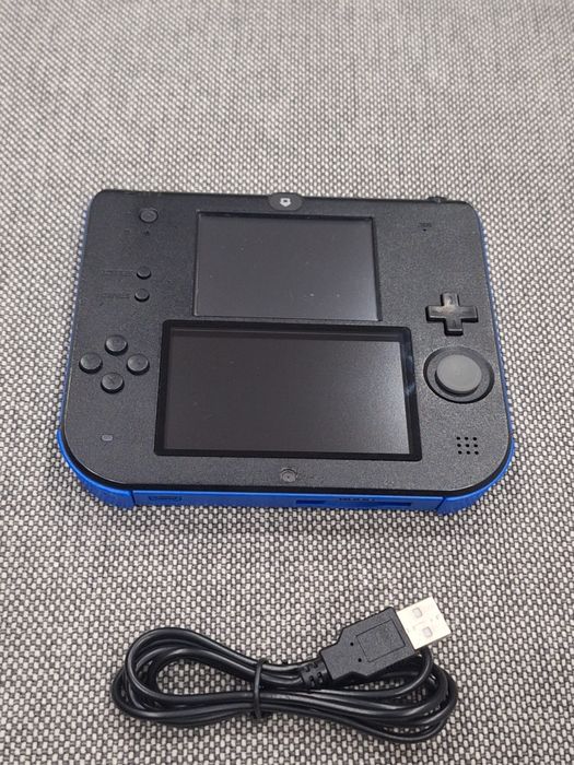 Nintendo 2DS com loja para instalar jogos e cartão de 64GB