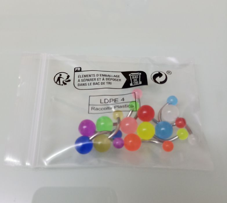 Piercing  umbigo fluorescente