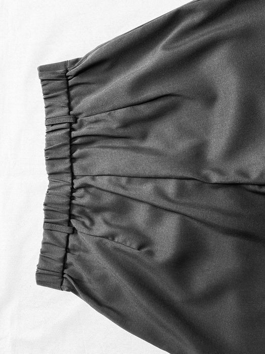Eleganckie spodnie damskie rozszerzane czarne M