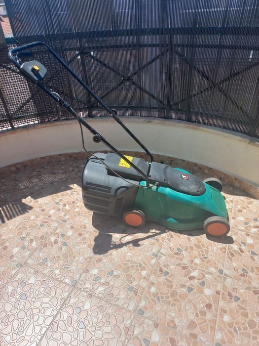 Maquina de cortar relva.