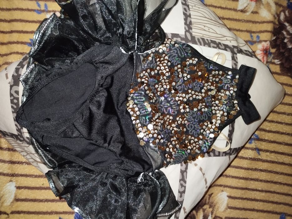 Купальники для гімнастики