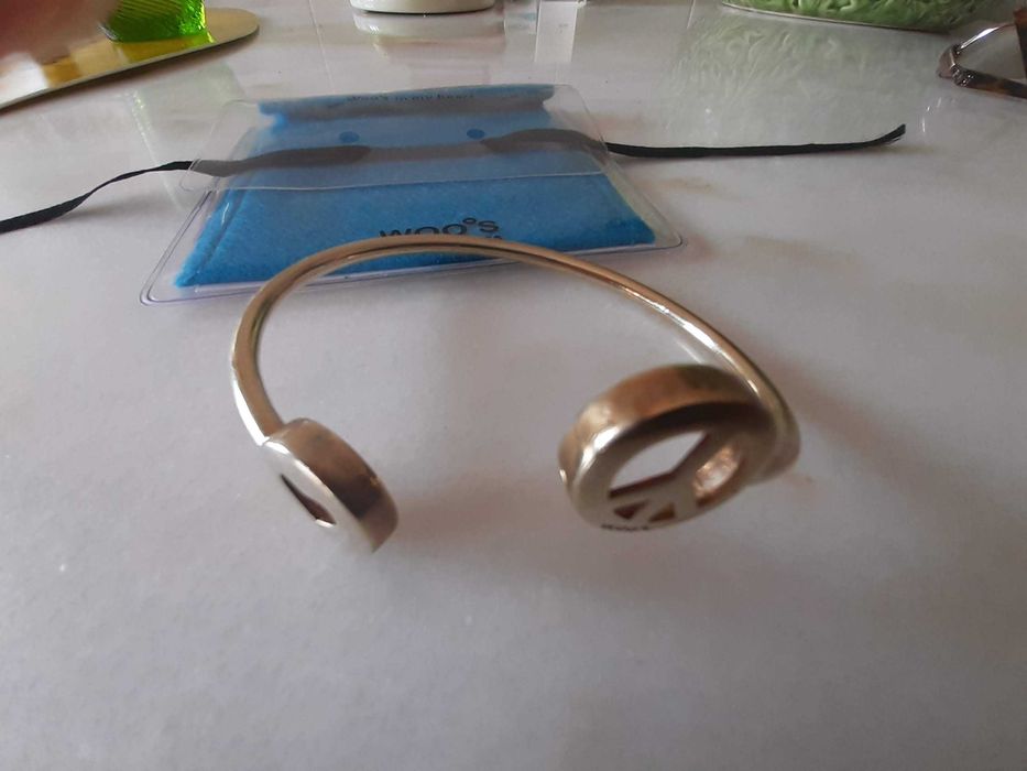 Pulseira prata dourada Woo's, nunca usada, na embalagem original