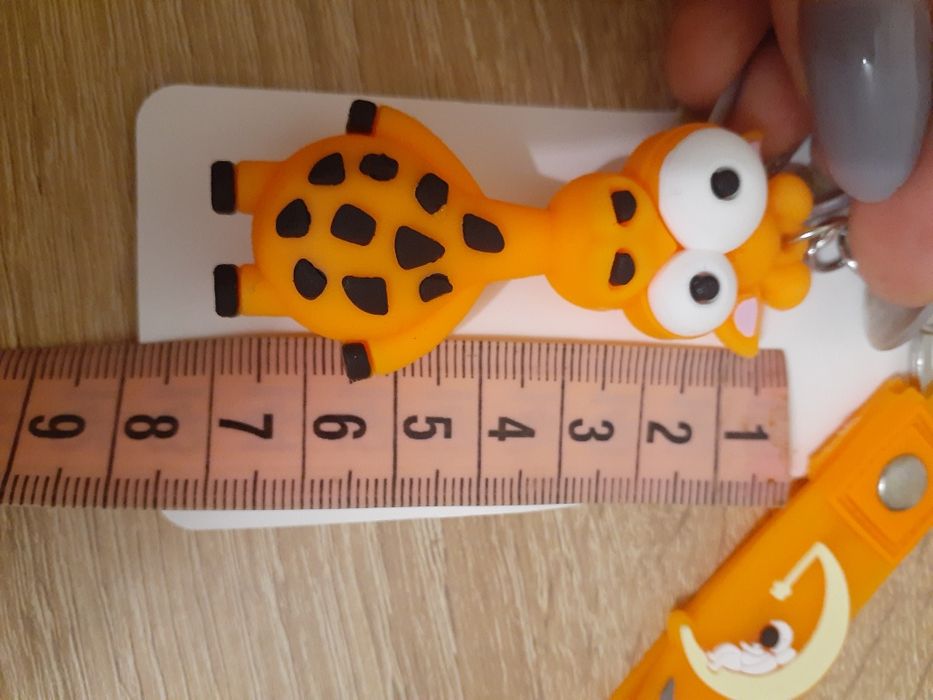 Новый Брелок силикон (жираф глаза)