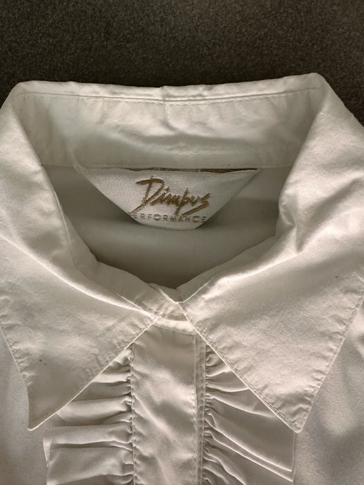 Camisa branca com folhos frente em estado novo