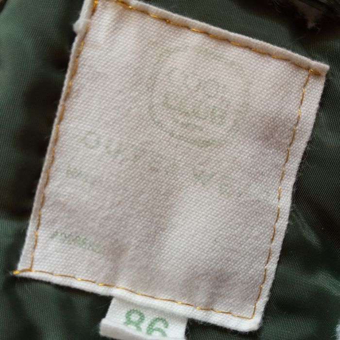 Ciepła kurtka dla dziecka zielona z futerkiem kaptur wzrost 86 cm