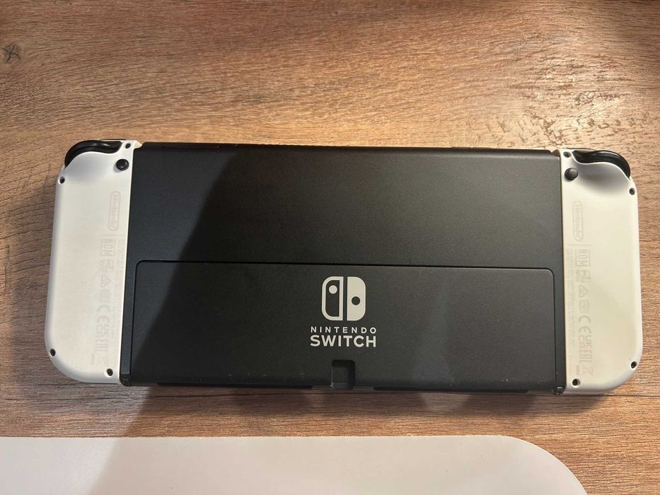 Nintendo Switch Oled + 4 jogos + caixa + bolsa – Excelente estado