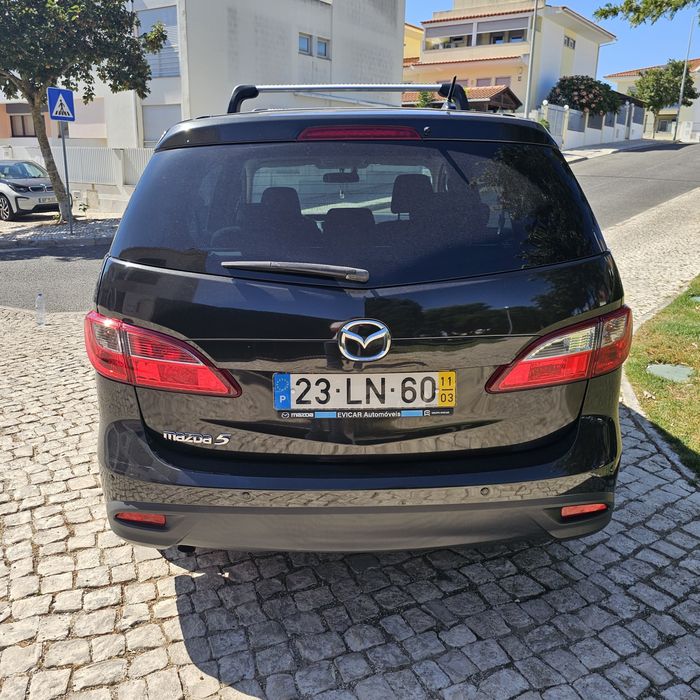 Vendo masda 5 de 2011 de 7 lugares com apenas 163 mil km esta rigorosamente impecável