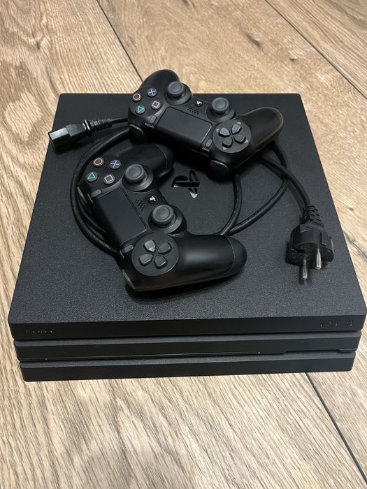 Playstation 4 Pro + 2 pady