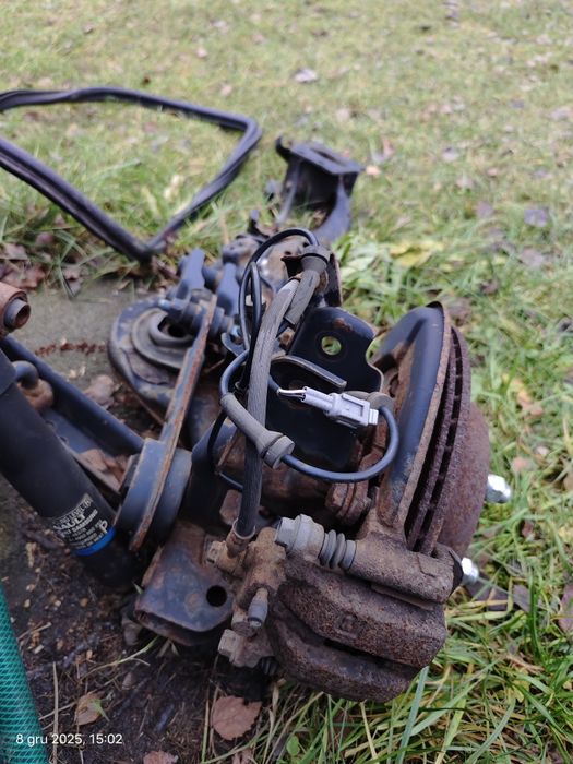 Piasta łożysko wahacz zacisk tarcza Lewy tył Renault Koleos Qashqai