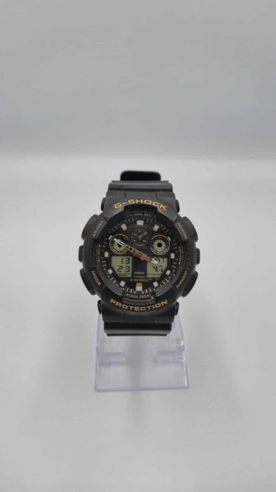Zegarek Casio G-Shock GA-100GBX – czarny ze złotymi wstawkami