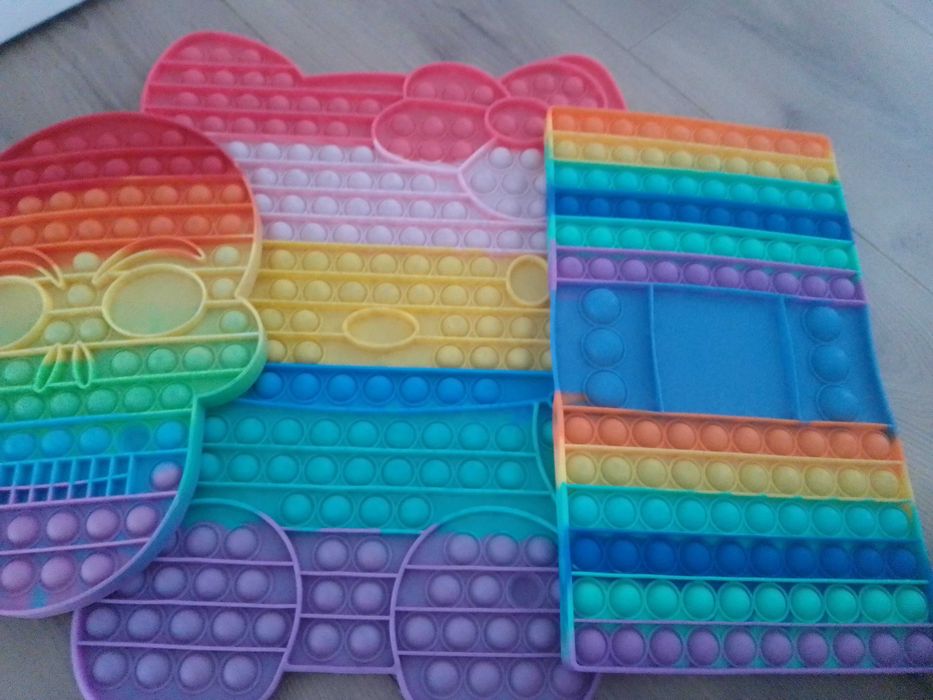 3 Popets: a Hello Kitty giant, a Piper board, and a medium-sized Popet64740956566913120