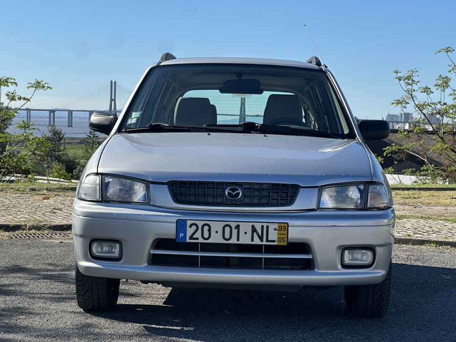 Mazda Demio 1.3 Glx de 1999 a gás