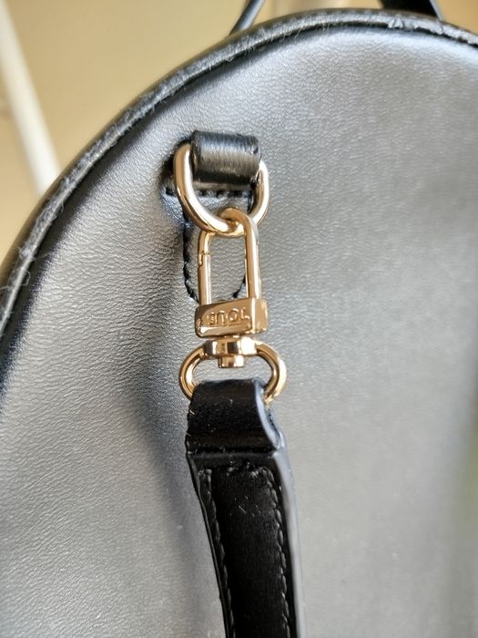 Mochila preta da tous  tenho certificado de autenticidade