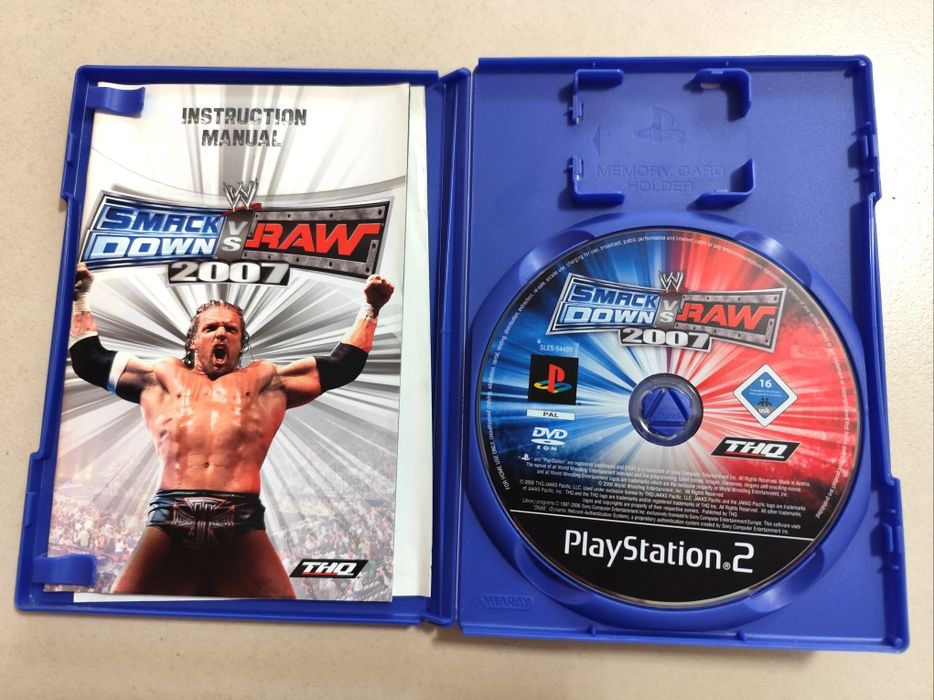 Jogo para PlayStation 2 (PS2) - Smack Down vs Raw 2007
