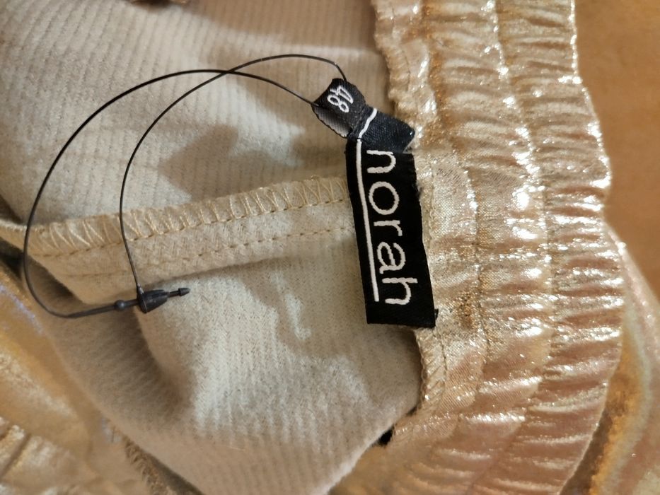 Spodnie wieczorowe złote, jak nowe, duży rozmiar.