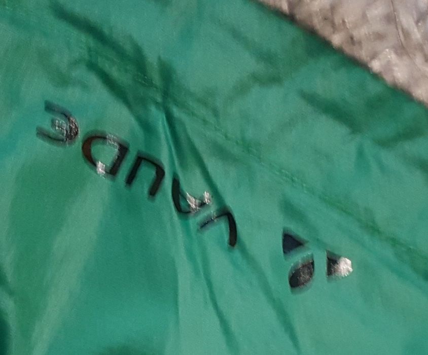 Оригинал.фирменная,легкая,функциональная ветровка-дождевик vaude green