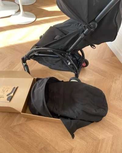 Carrinho de bebê compacto preto – leve, dobrável, em ótimo estado.