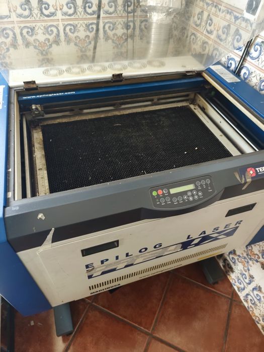 Máquina de laser