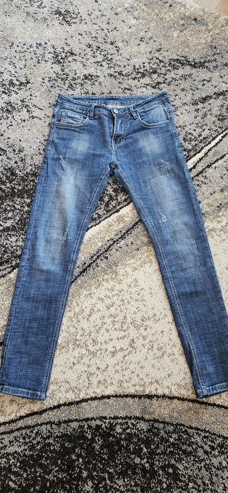 Jeansy damskie przecierane