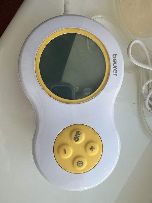 автоматичний молоковідсмоктувач medela