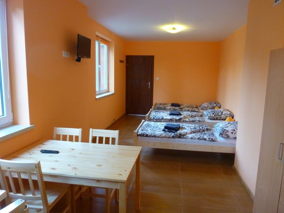 Kwatery pracownicze, noclegi w centrum Uniejowa, faktura