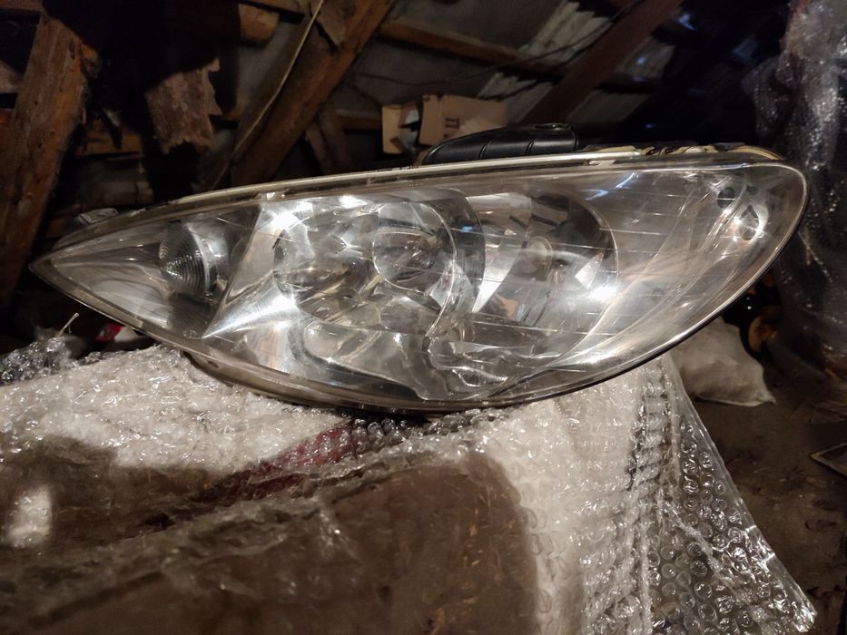 Фари Peugeot 206 оригінал