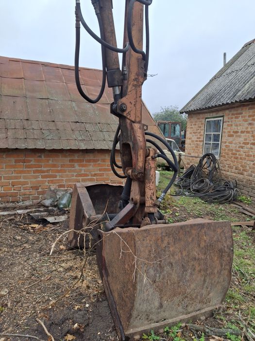 Грейферний погружчик юмз