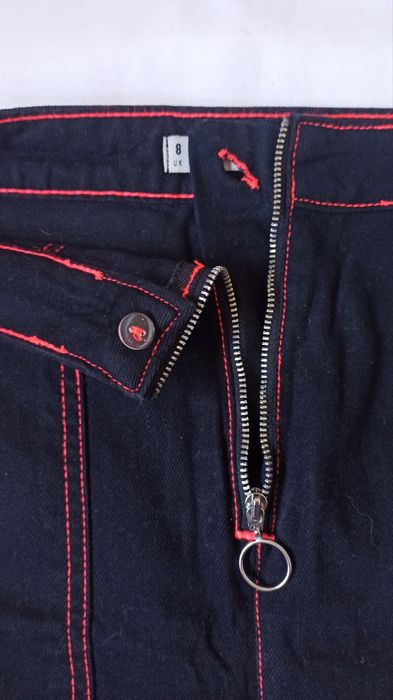 Mini saia preta com costuras neon S Denim Co
