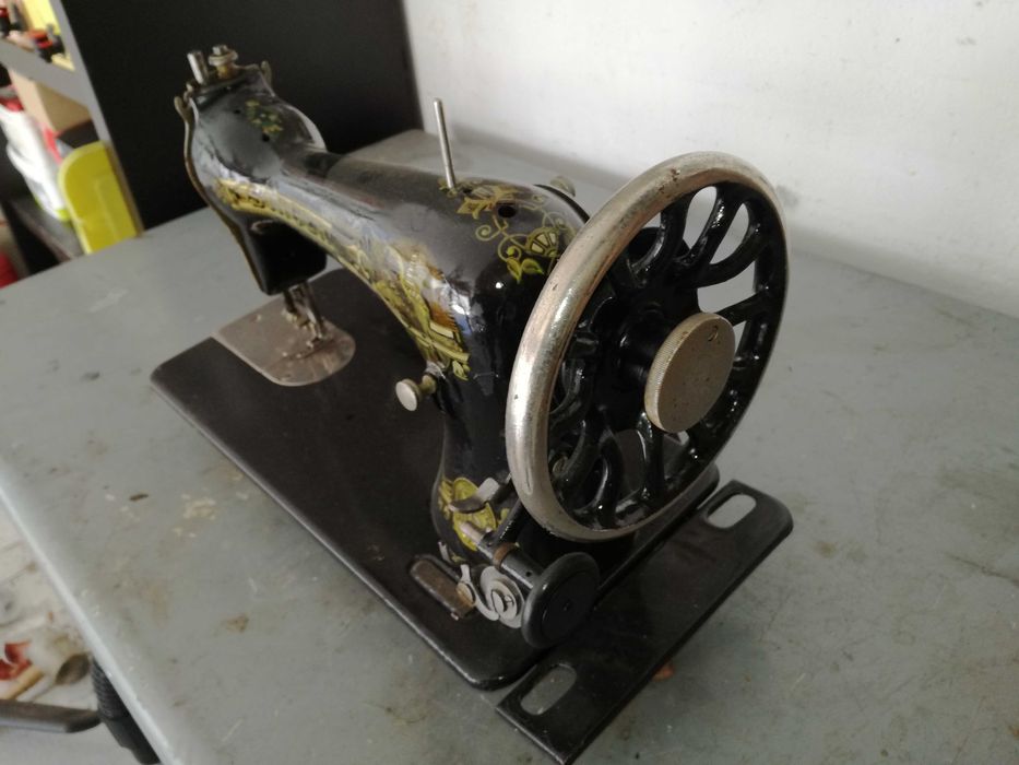 Cabeças de máquinas de costura Singer