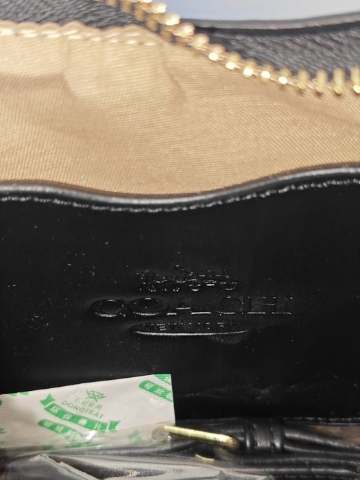 Carteira coach nova