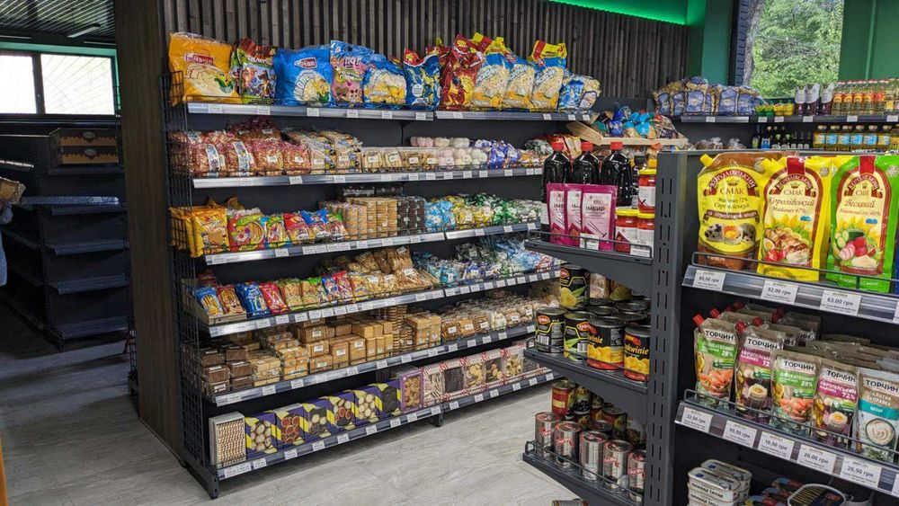 Торгові стелажі. Каси прилавки. Гачки торгові Вітрини Магазин під ключ