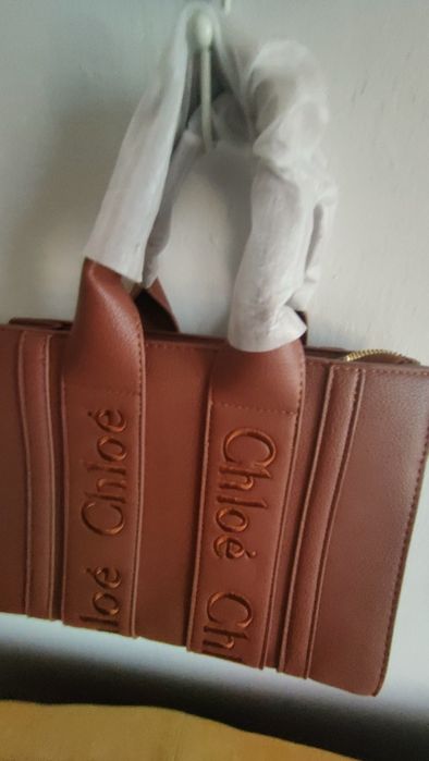 Mała nowa  torebka z napisem Chl